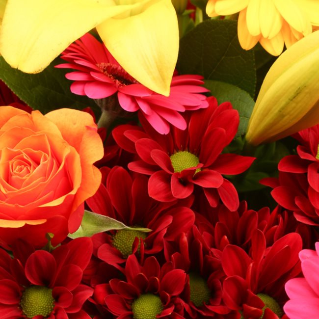 Get Well Balloon & Warm Sunset Flowers£19.99